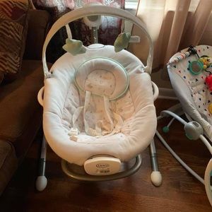 Baby swing with portable rocker